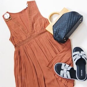 Rust Sleeveless Dress with Black Accessories